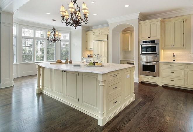 newly installed grey laminate floors in modern kitchen in Buckley